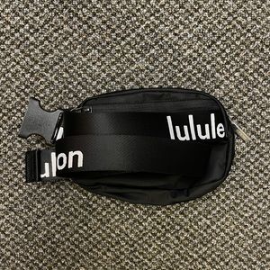 Lululemon Everywhere Belt Bag- Black and White Wordmark color